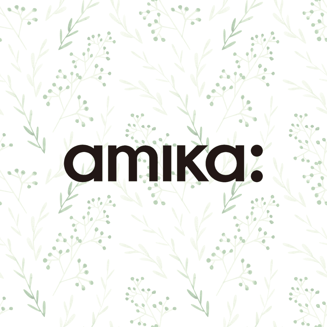 amika: logo on a floral, botanical background